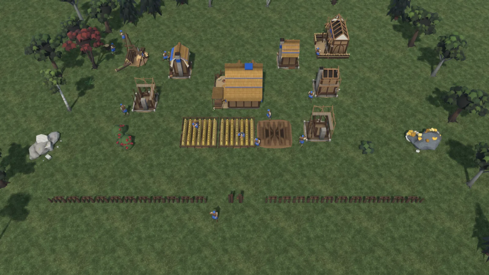 The village grows: new houses, a mill and barracks under scaffolding, a palisade going up